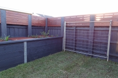 Custom merbau fence extensions and garden bed