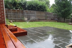 Merbau decking and natural bluestone paving